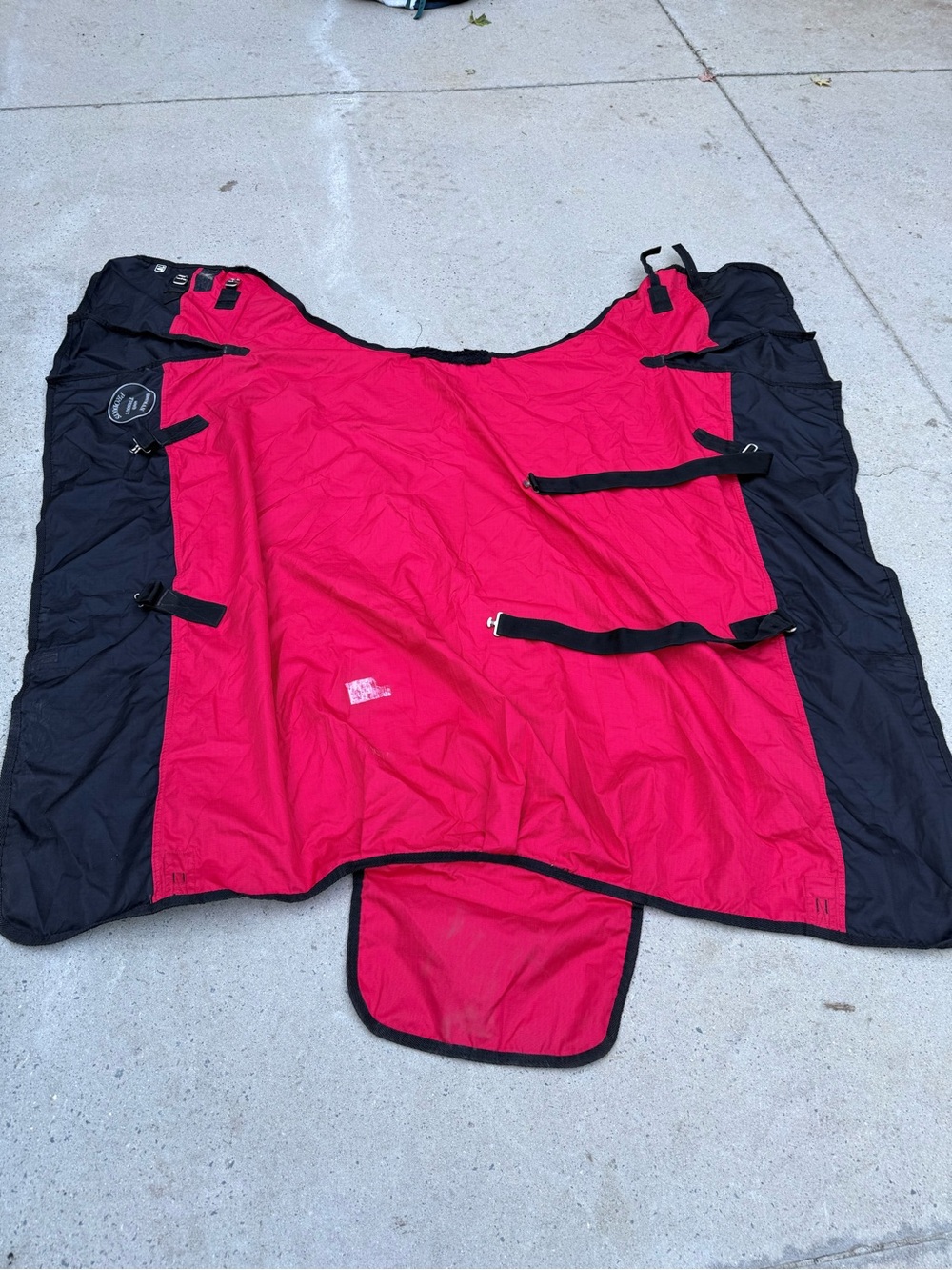 Showman Turnout sheet Red w/ black horse size 70 w/ adhesive white residue